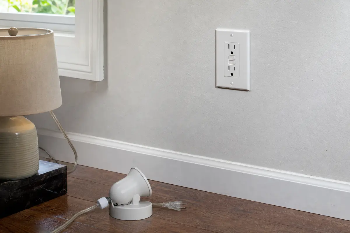 AFCI buzzing room-side check at a wall device before opening the box