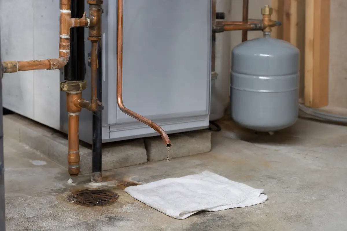 Relief discharge pipe dripping near boiler expansion tank clue