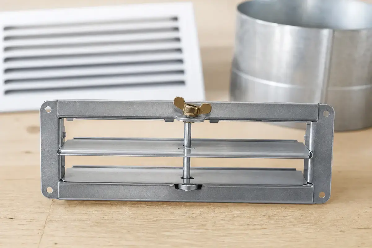 Register damper assembly checked after an AC supply register drip is fixed