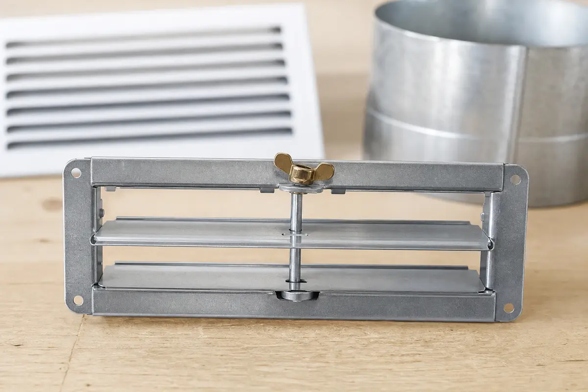 Replacement register damper insert on a workbench