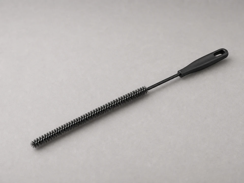 Coil cleaning brush tool