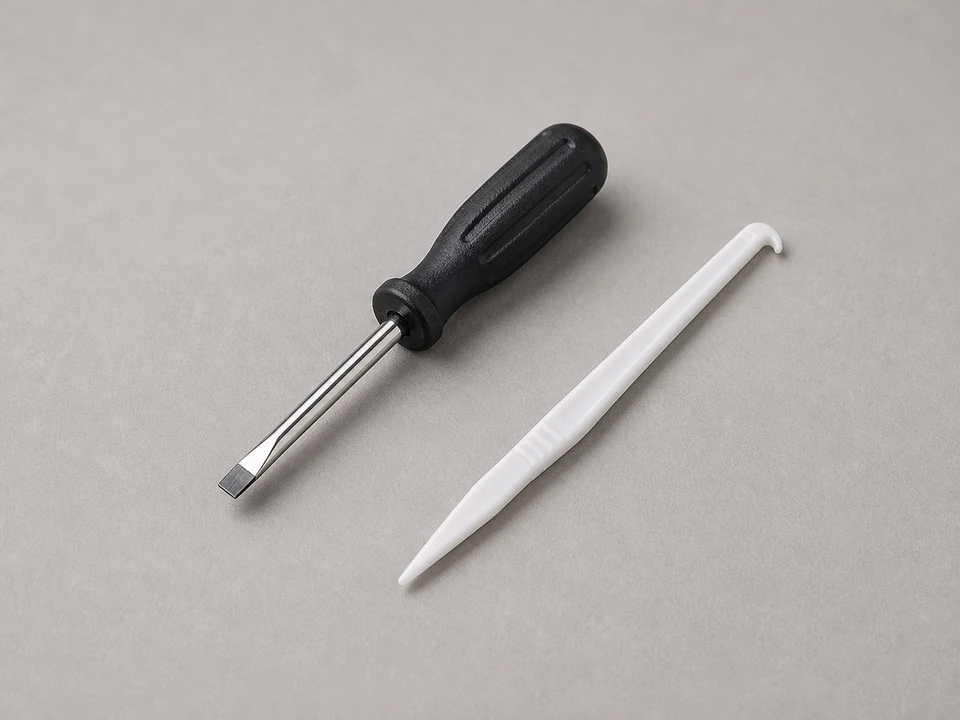 Small flat screwdriver or pick tool