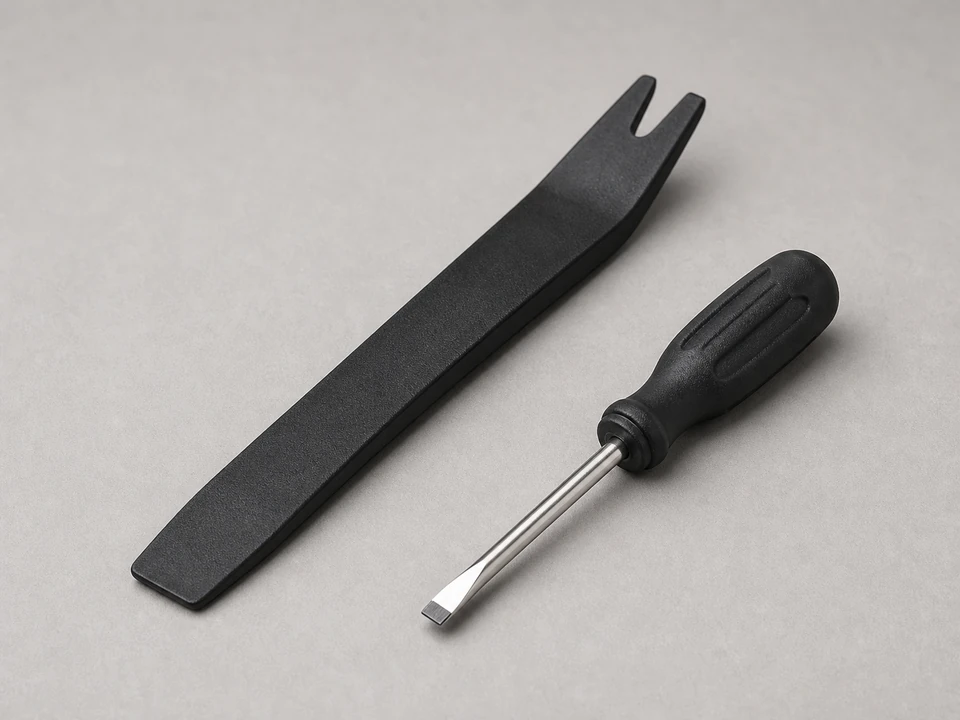 Small pry tool releasing dehumidifier switch tabs