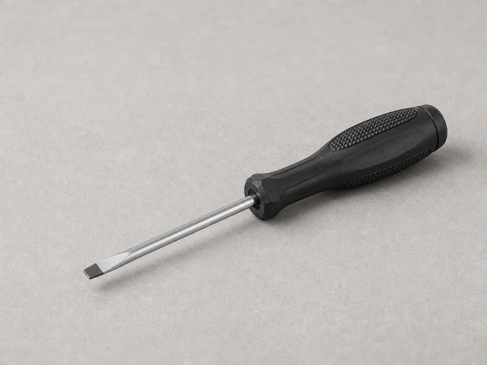 Small flat screwdriver for lifting a hose bib vacuum breaker clip