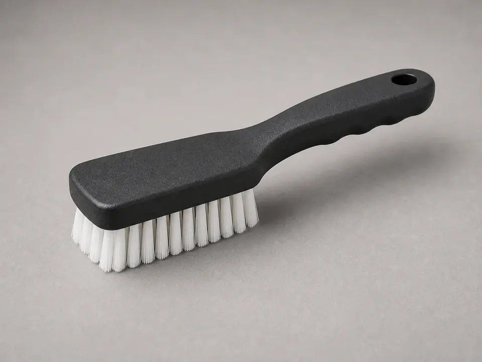Stiff push broom tool