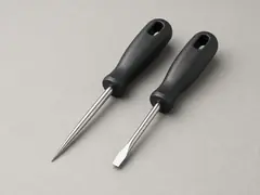 Awl or small flat screwdriver tool