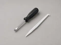 Flat screwdriver or small pick tool