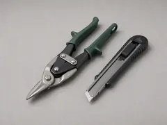Tin snips or heavy-duty utility knife tool