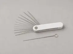 Nozzle cleaning tool tool