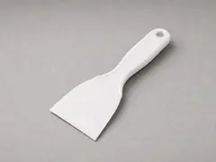 Plastic putty knife or old gift card tool