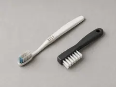 Old toothbrush or small nylon brush tool