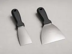 Putty knife or taping knife tool