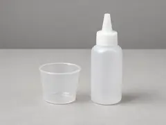 Small cup or squeeze bottle tool