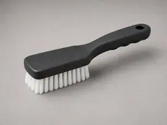 Stiff push broom tool