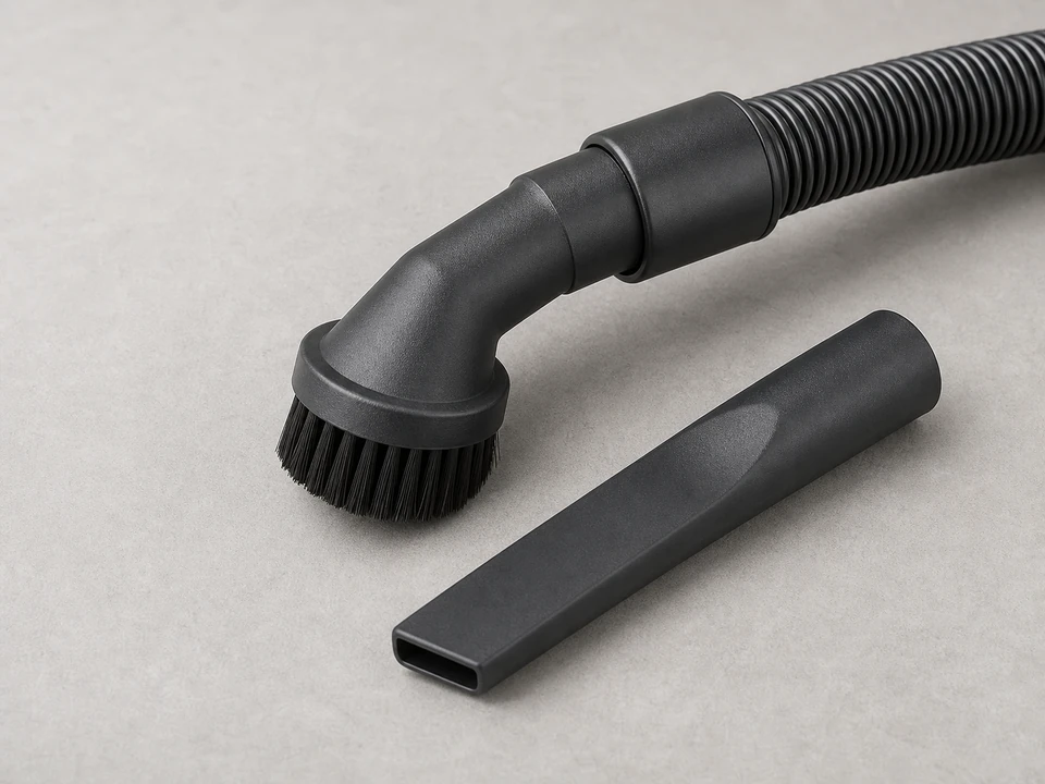 Vacuum with hose attachment tool